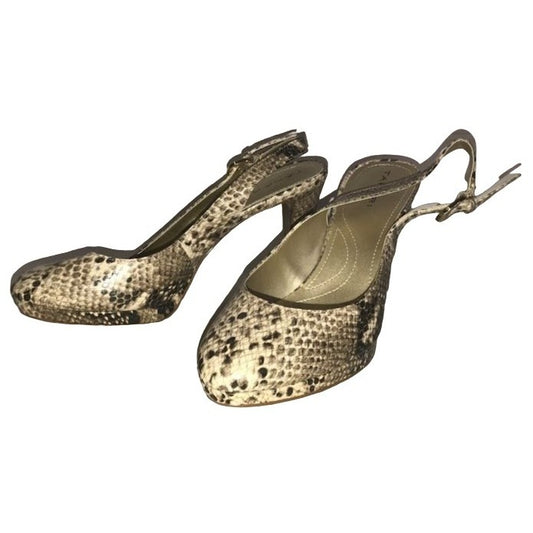 Thari Snakeskin Texture heels - round toe with open heel and over heel buckle strap - 4" Heel believe they are womens size 8-8.5