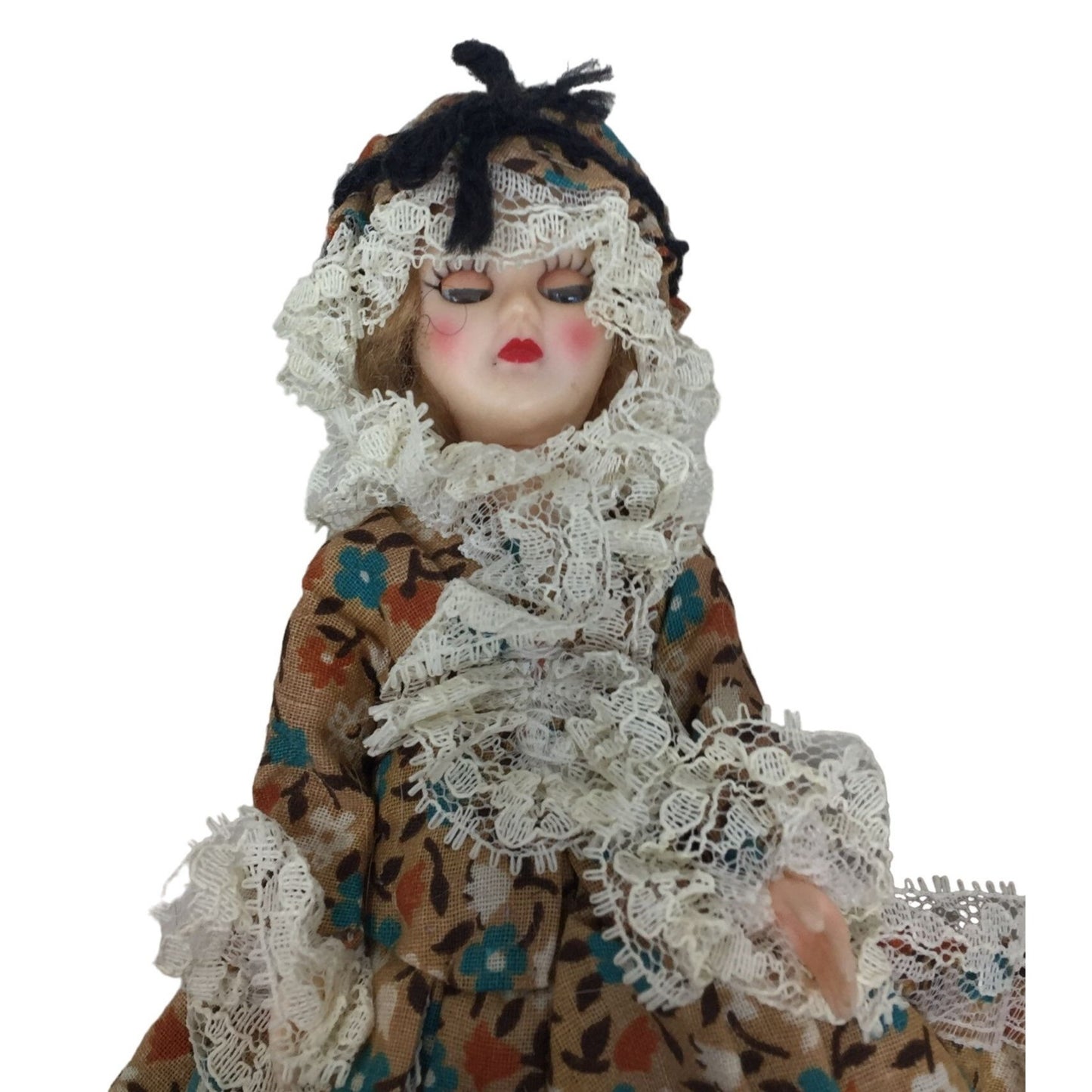 Vintage Black hair lace edged doll in brown floral print dress - eyes open and close