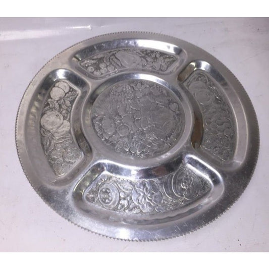 Silver serving tray that spins- many details etched in each segment - very nice piece