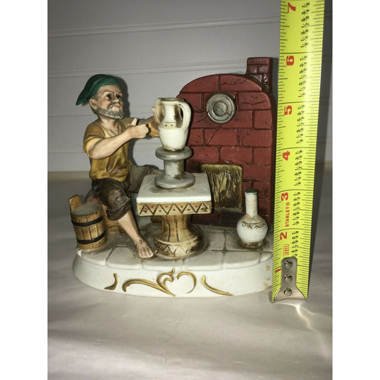 Vintage Potter with Hat on Barrel making Vase Porcelain Figurine