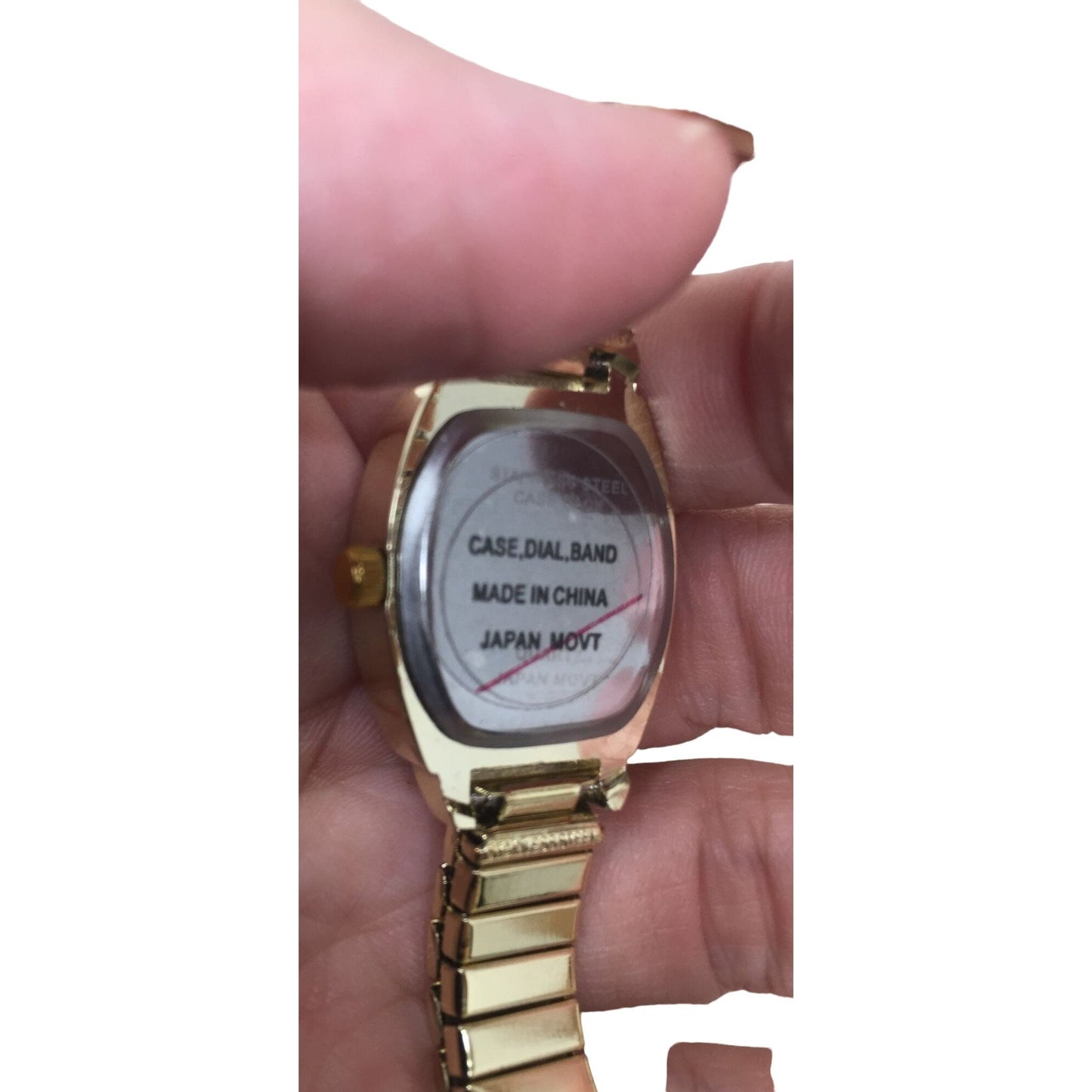 Gold Tone Women's Wristwatch with rhinestones around face - Nice style