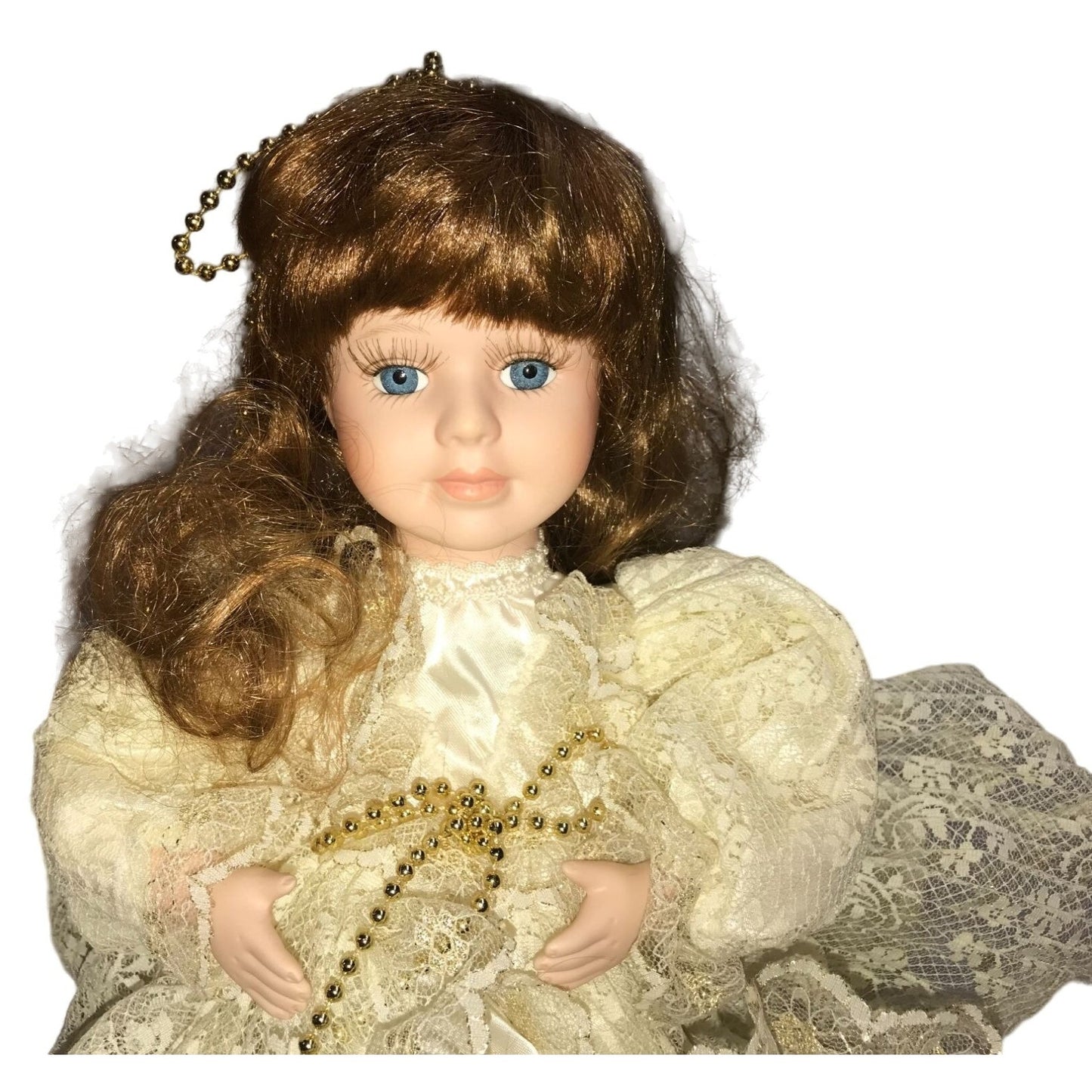 Animated Porcelain Doll - arms move in and out like leading music or clapping - very pretty face - ivory silk outfit w/ gold accents -