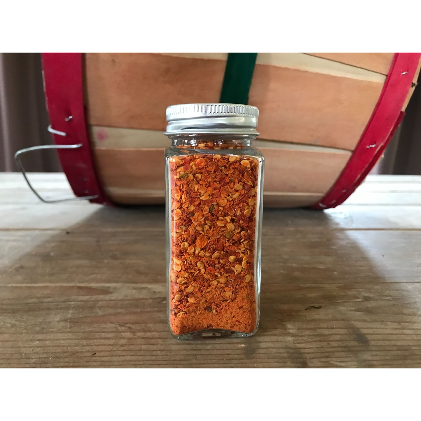 Dried and crushed Red Chili peppers to add a kick!  No other ingredients.