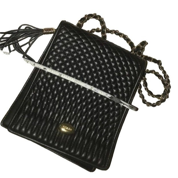 KOSHI - compact women's shoulder or crossbody bag - black textured purse with chain-looking strap - Black with brass hardware - tassels - Te