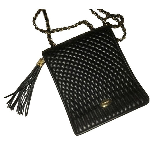 KOSHI - compact women's shoulder or crossbody bag - black textured purse with chain-looking strap - Black with brass hardware - tassels - Te