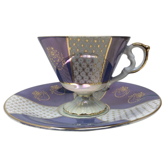 Blue and white Iridescent Teacup and Saucer Set with small gold accent pattern