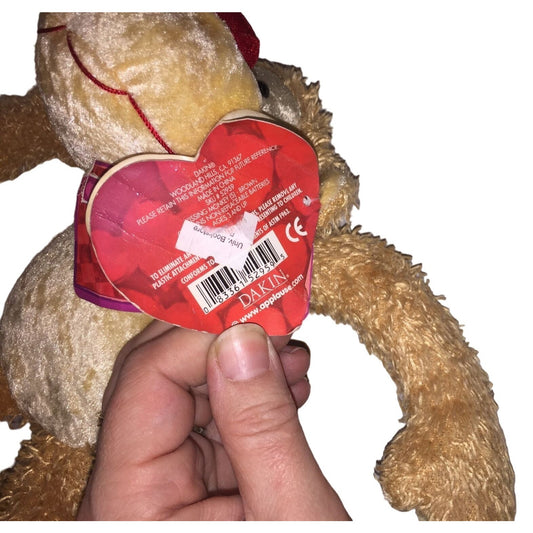 Cute DAKIN Plush Monkey with very large Heart shaped nose. Original Tags attached.