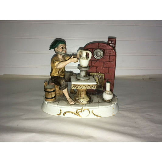 Vintage Potter with Hat on Barrel making Vase Porcelain Figurine