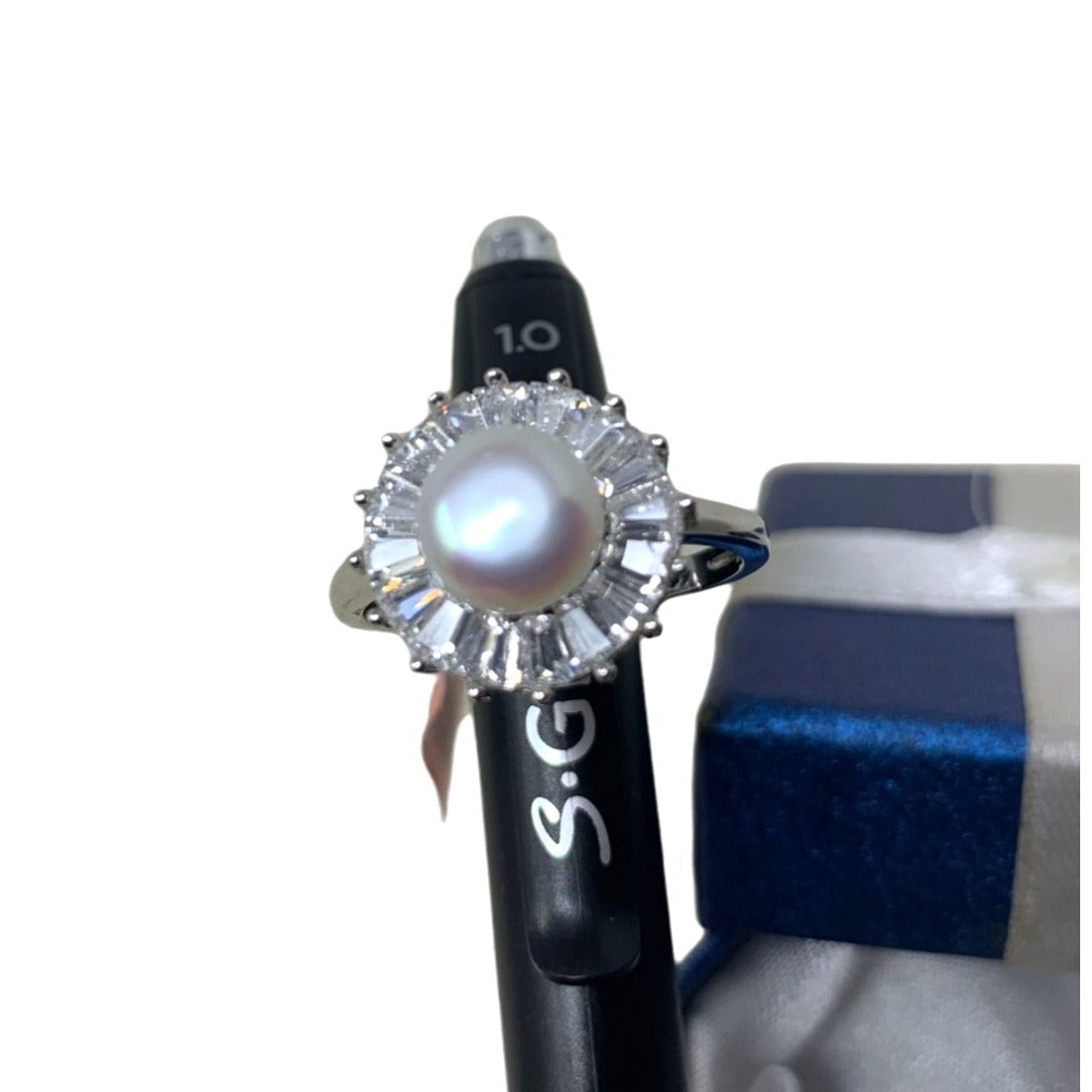 Sterling Ring - Large Pearl-like stone with Pretty Burst of gems surrounding Pretty!