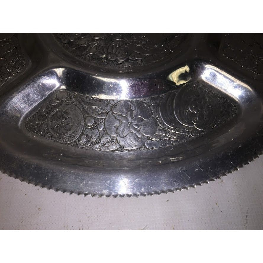 Silver serving tray that spins- many details etched in each segment - very nice piece