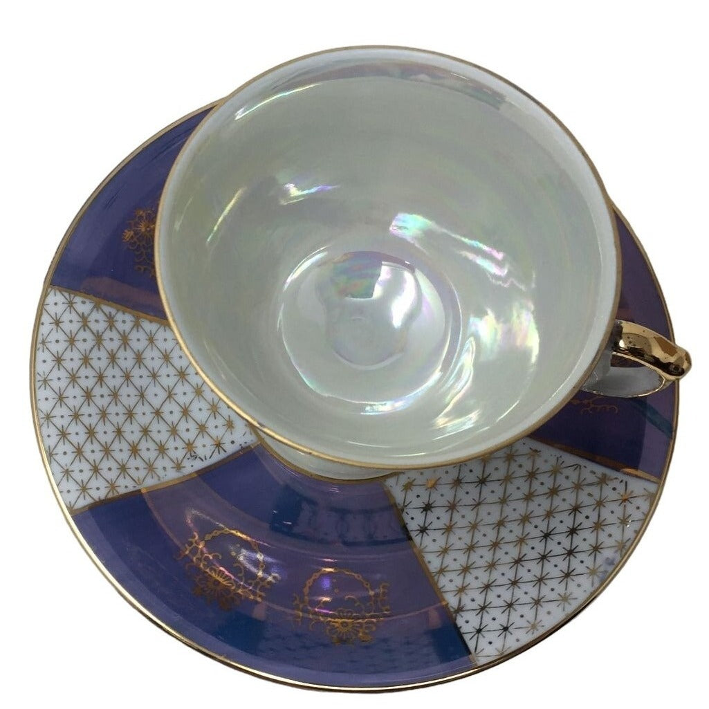 Blue and white Iridescent Teacup and Saucer Set with small gold accent pattern