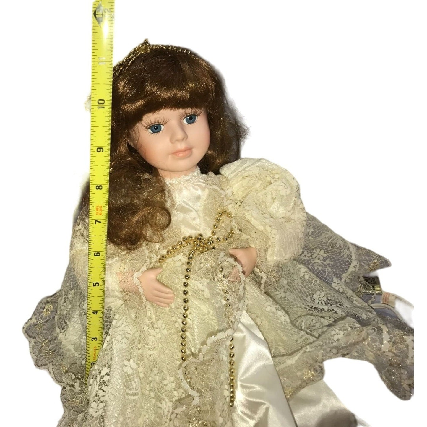 Animated Porcelain Doll - arms move in and out like leading music or clapping - very pretty face - ivory silk outfit w/ gold accents -