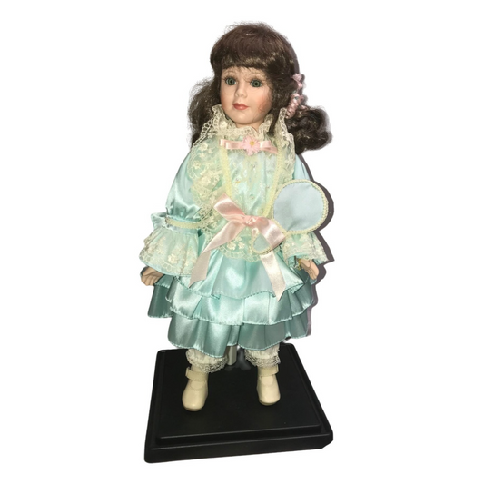 bright eyed porcelain doll - limited edition approx 16" tall (numbered) long brown hair faux mirror accessory and stand included