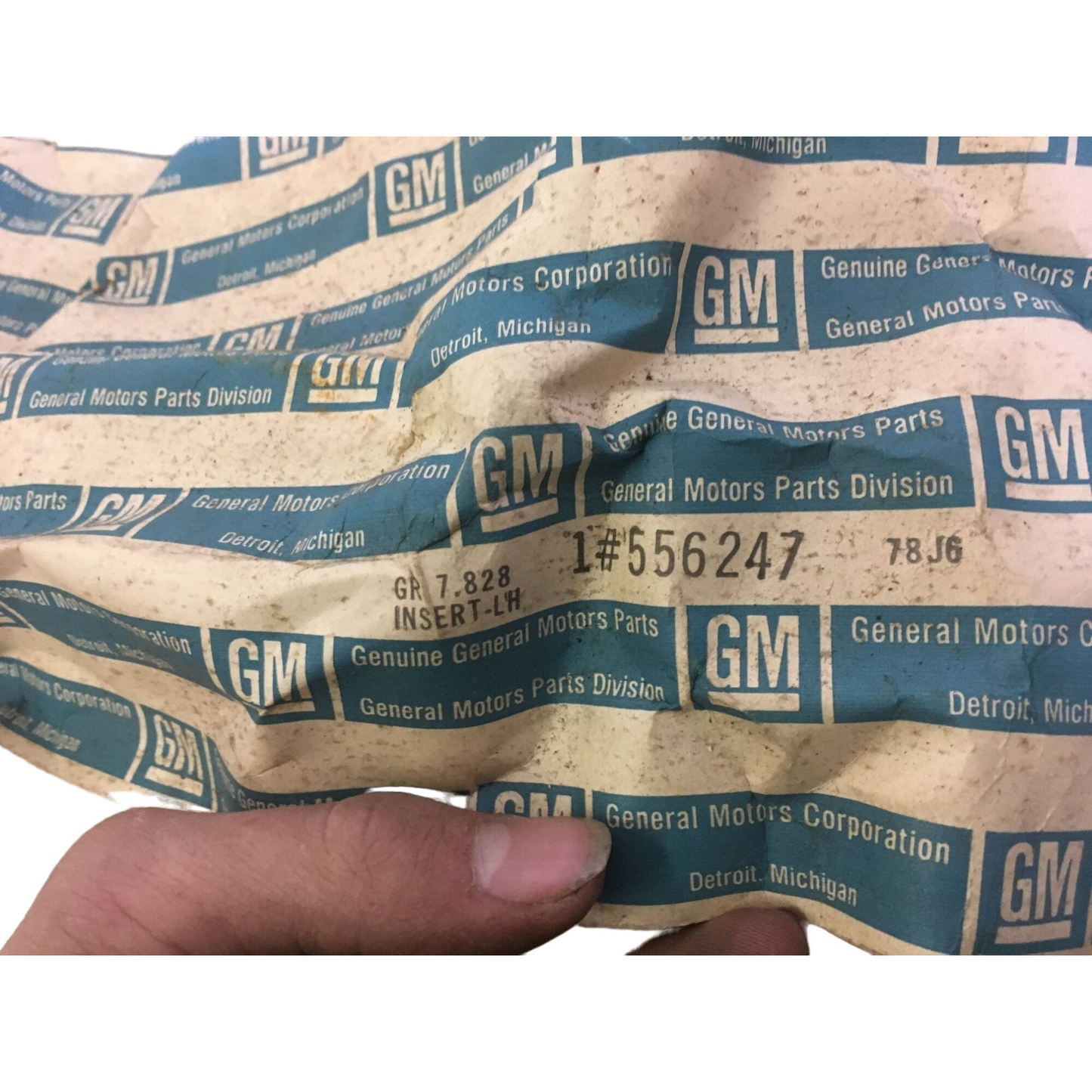 Genuine NOS GM vintage Auto  Part no 556247  INSERT - LH  - GR 7.828 - 78J6  - Discontinued General Motors OEM Part