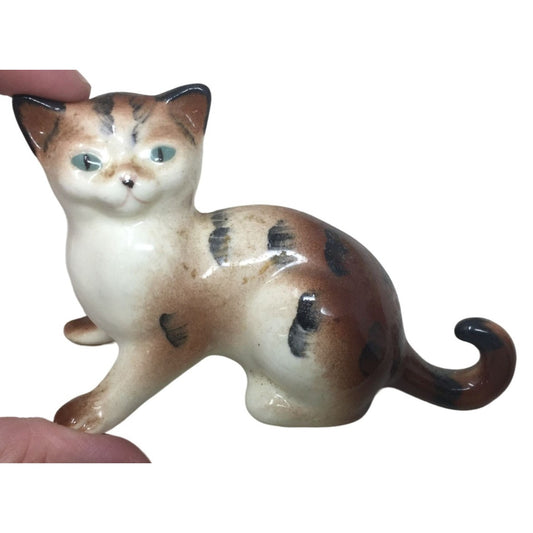 Small Cat figurine - white face and checs with multi color tiger heat, feet and back end