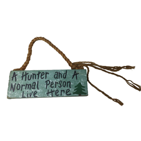 A Hunter and a Normal Person Live Here - Novelty Hunter Gift Cute Hunting Spouse Sign