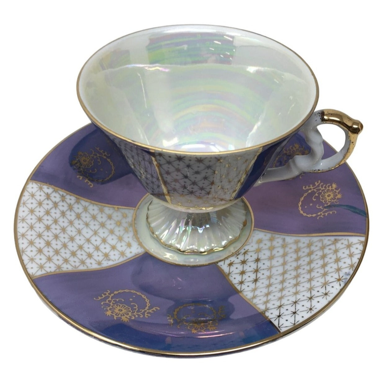 Blue and white Iridescent Teacup and Saucer Set with small gold accent pattern