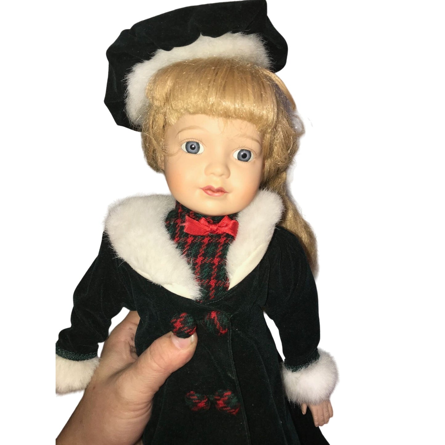 Holidays Porcelain Doll - Blonde Girl in long green jacket with red accents and white fur collar - Winter themed collectible doll