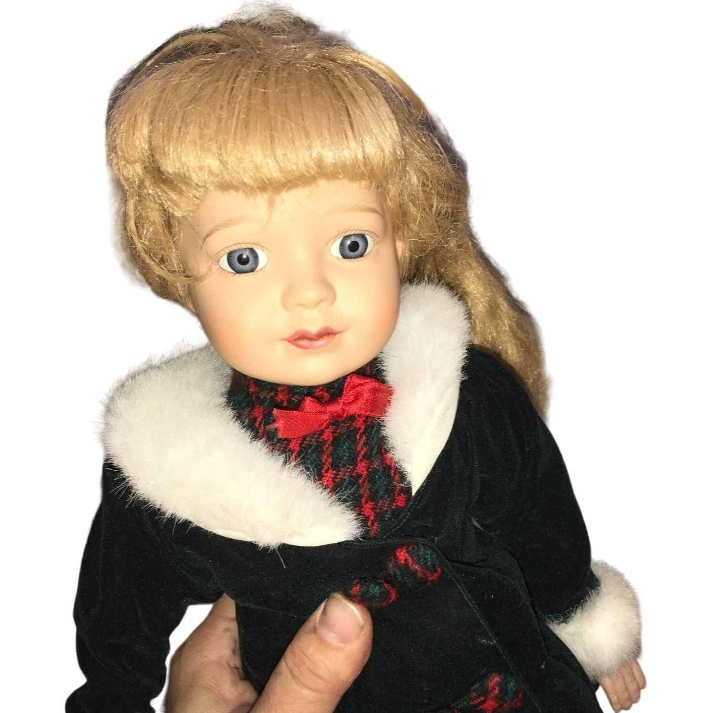 Holidays Porcelain Doll - Blonde Girl in long green jacket with red accents and white fur collar - Winter themed collectible doll