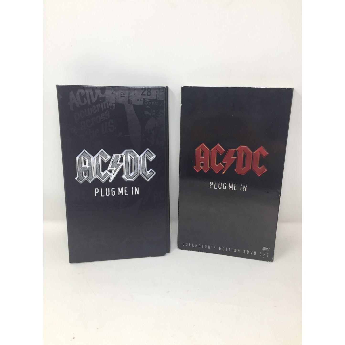 ACDC Rock and Roll 'PLUG ME IN" Collectors edition 3 disc DVD Set. With Dvds and Poster, chit etc.